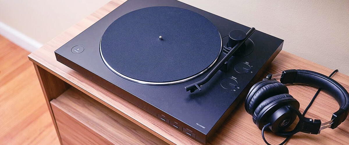 can I connect a budget turntable to modern audio systems and speakers?